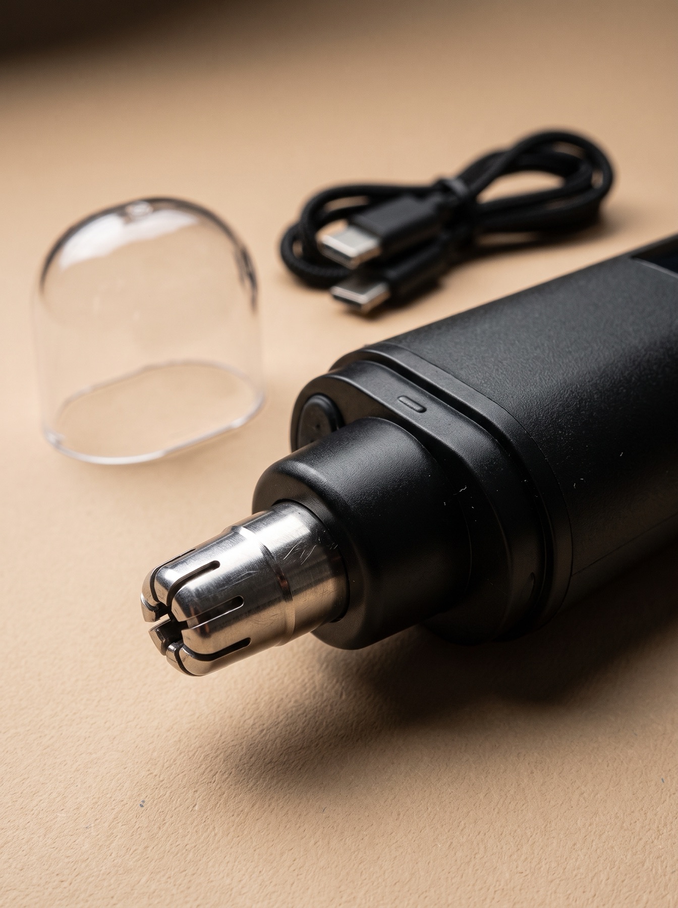 Close-up of the MRGROOMED trimmer's precision head